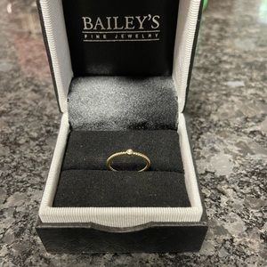 Solitaire Bezel Diamond Ring. Size 5 and 3 quarters, could fit a 6. NEVER WORN!